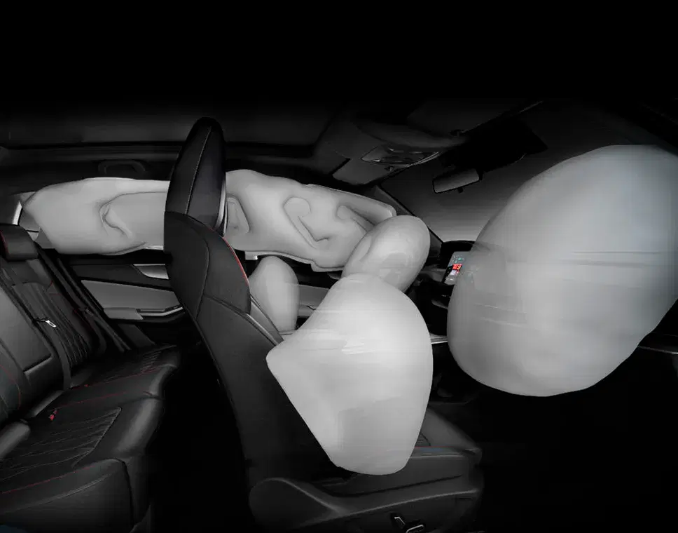 Interior of a car showing the passenger side dashboard with an airbag icon.